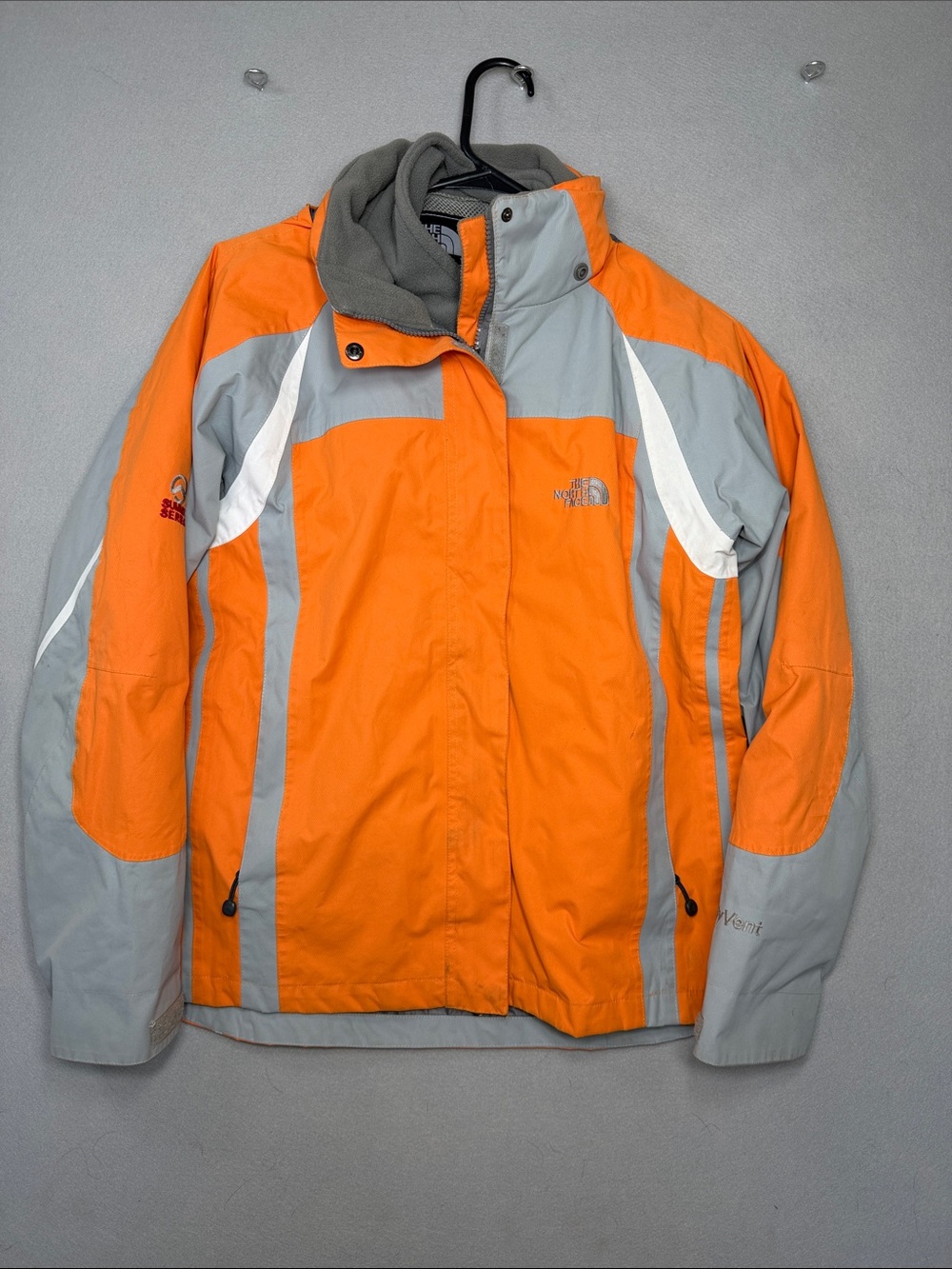 The North Face summit series Orange and Light Gray Colorblock Shell Jacket